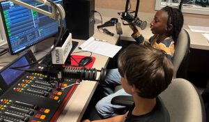 Campers learn how to produce a radio broadcast in the WGMU studios.